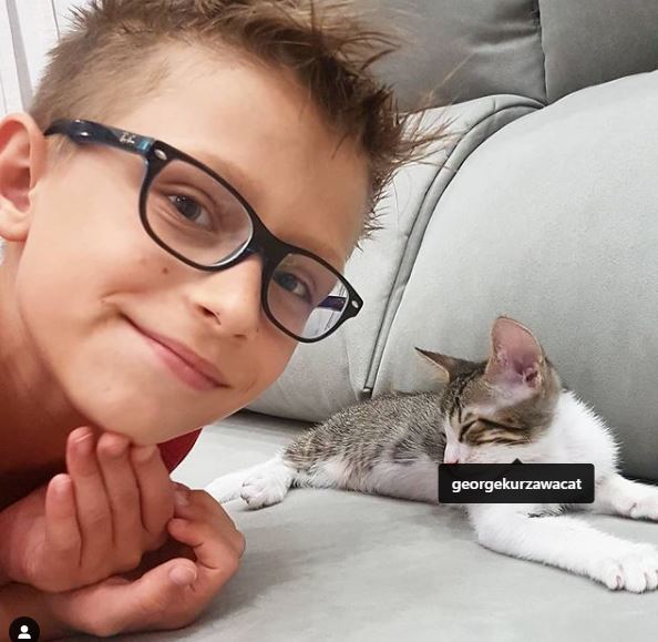 Ronald Kurzawa with his pet cat George Kurzawa