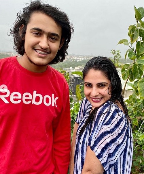 Sakshi Joshi enjoying rain with her son Aaryaman Kapri