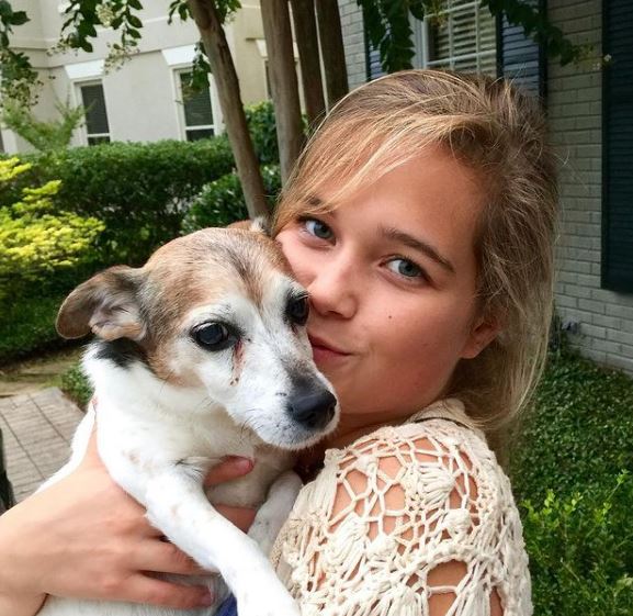 Sarah Catherine Hook with her pet dog