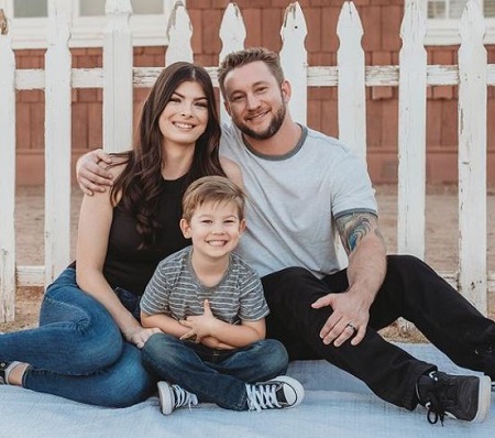 Taylor Misiak brother Bryce Thayer and his wife Brittany Courtois Thayer and son