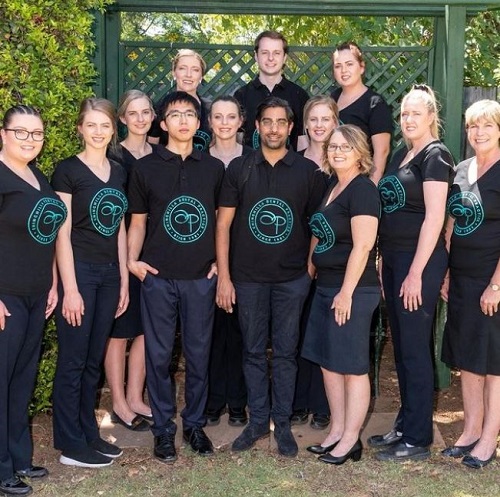 Tushaan Bhindi with his colleagues at Chinchilla dental practice