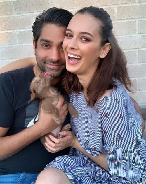 Tushaan Bhindi with his pet Coco and wife Evelyn Sharma