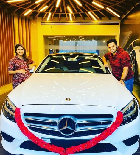 Alya Manasa and her husband Sanjeev Karthick with their brand new Mercedes