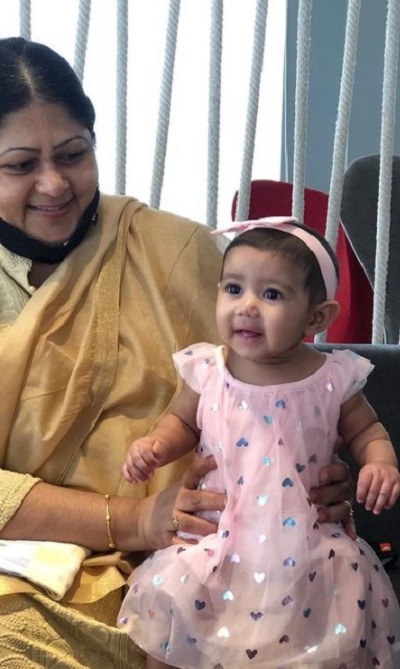 Alya Manasa's daughter Aila with her grandmother