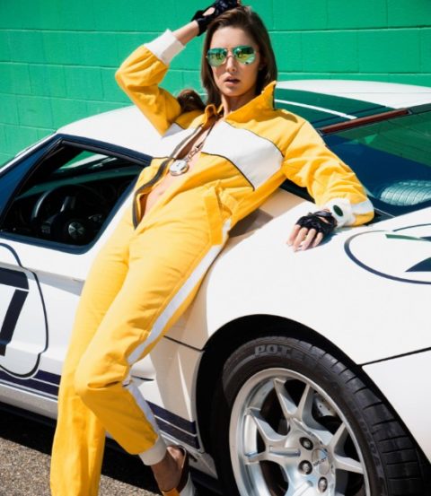 Alyssa Arce posing on a Ford GT-40