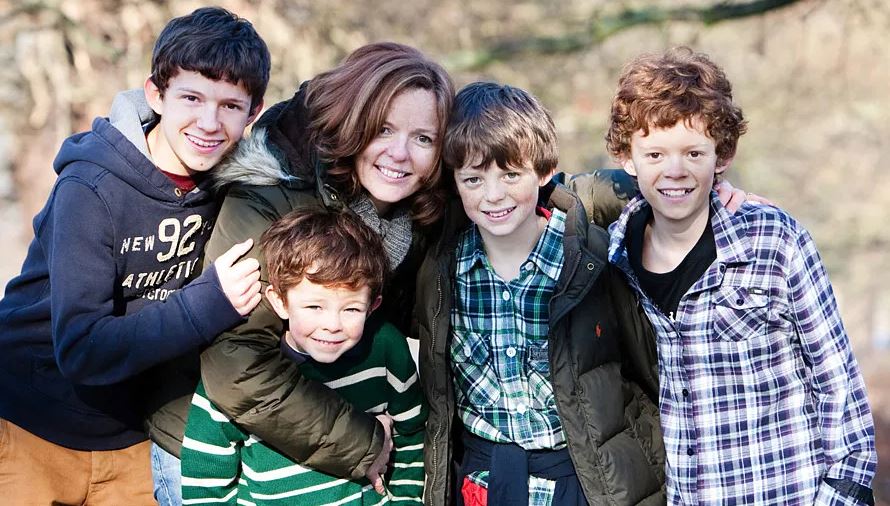 An old photo of Harry Holland with his mom Nicola Holland, brothers Tom Holland, Sam Holland, and Paddy Holland