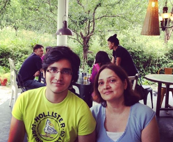 An old photo of Jehan Handa with his mother