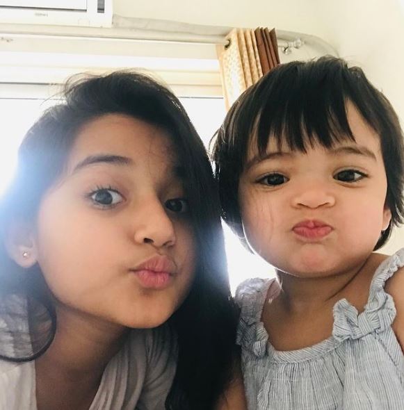 Aura Bhatnagar and her younger sister
