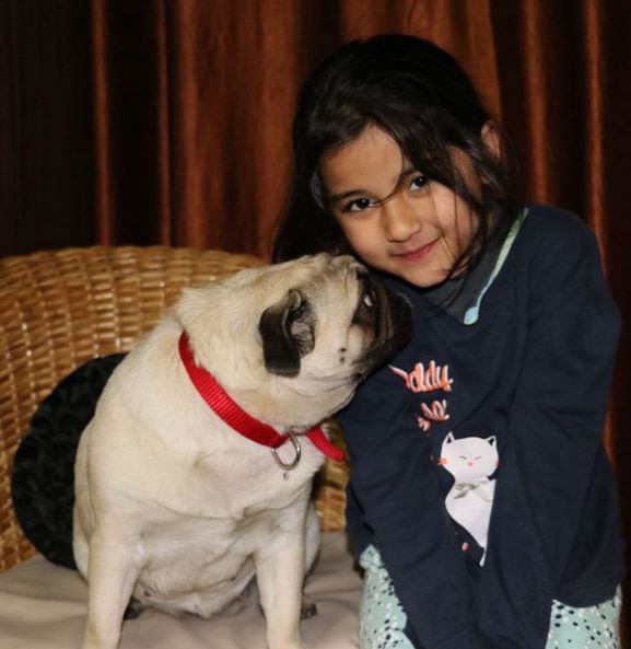 Aura Bhatnagar with her dog