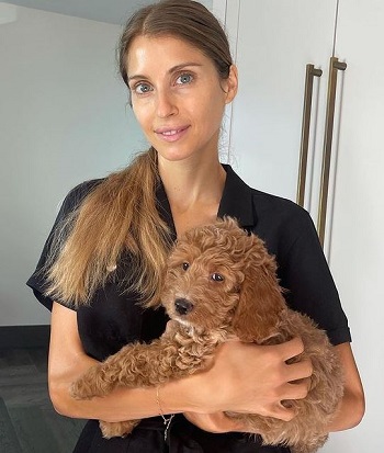 Cathy Hummel with pet dog Moon