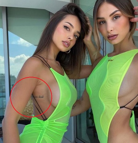 Dani Torres has a tattoo on her back