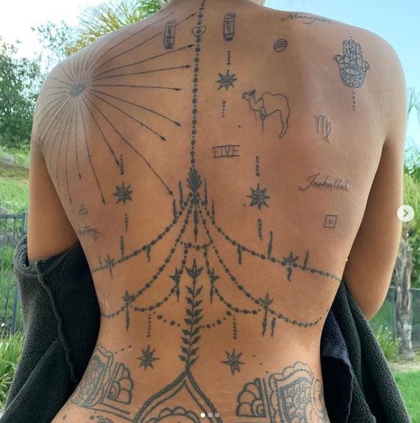Dreka Gates tattoos on the back