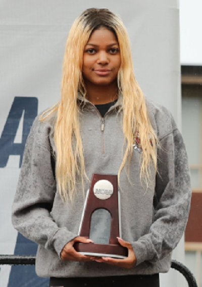 Gabby Thomas receiving an award
