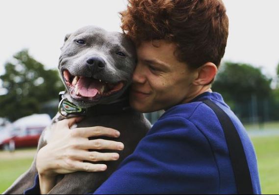 Harry Holland with his pet dog