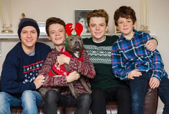 Harry Holland with his siblings