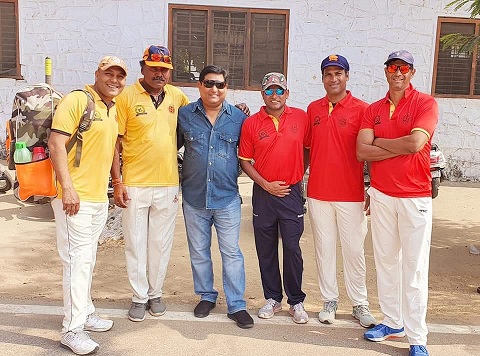 Harshvardhan Jain posing with the Rajasthan Ranjis