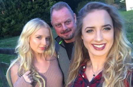 Kara Maxine Kavajecz and her sister Karly Kavajecz with their dad