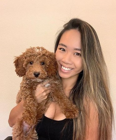 Katherine with her pet dog Koa The Doodle