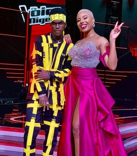 Kpee (Singer) was first selected by Falz and then stolen by Darey in the Knockouts round in the reality show The Voice Nigeria Season 3