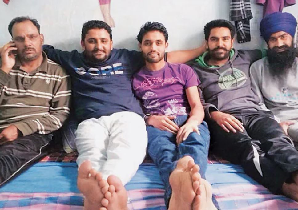 Kulbir Naruana with friends (picture taken by him from the jail and uploaded on facebook on march 12)