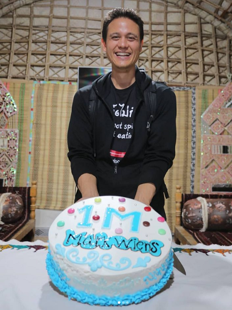 Mark Wiens celebrating reaching 1 million followers on Instagram