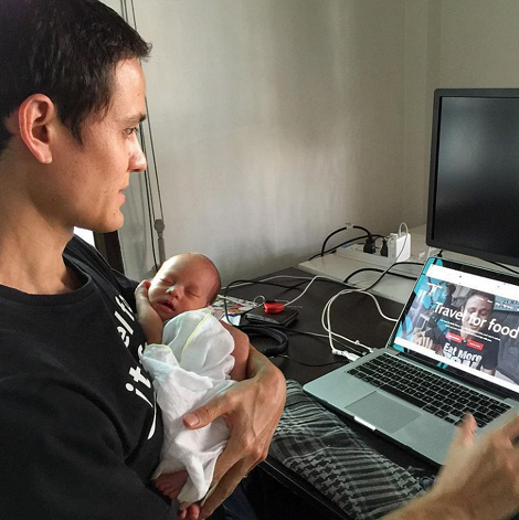 Mark Wiens with baby son Micah Wiens