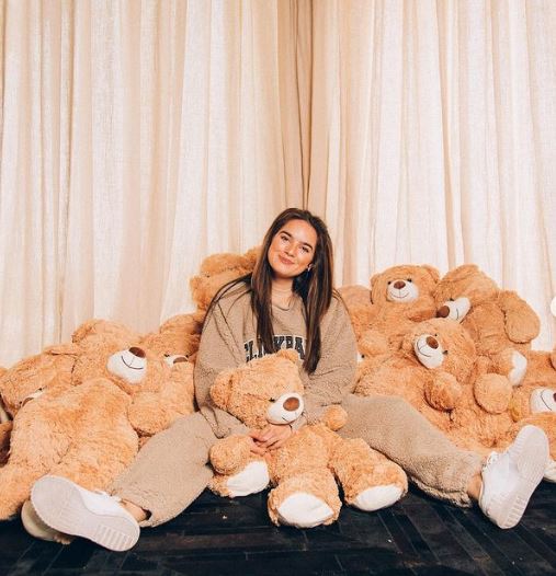 Natalie loves stuffed toys