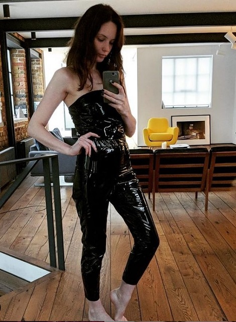 Olwen Kelly posing in front of a mirror