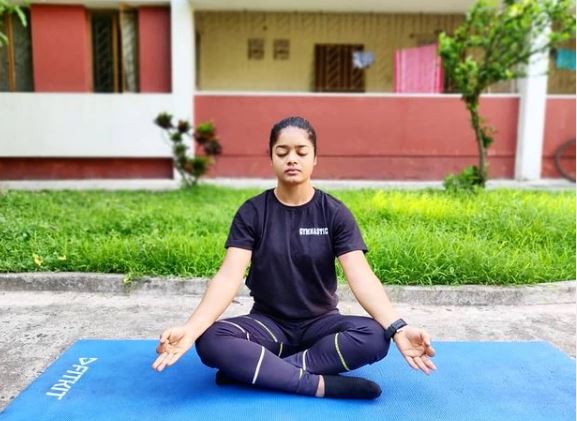Pranati Nayak practices yoga