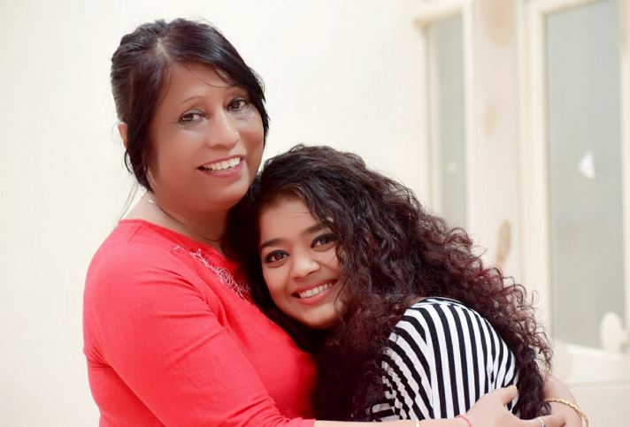 Pranati Nayak with her coach Minara Begum