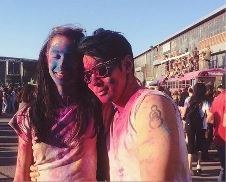 QPark At A Holi lot with his girlfriend Edith Oquendo