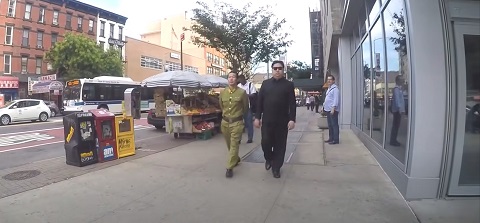 QPark walking on the streets with Dragon King as Kim Jong Un
