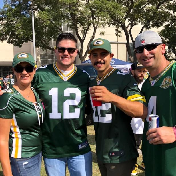 Realtor Joshua supporting Green Bay Packers with his friends