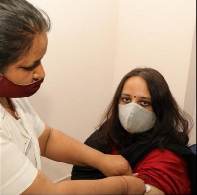 Remya Mohan while taking vaccine