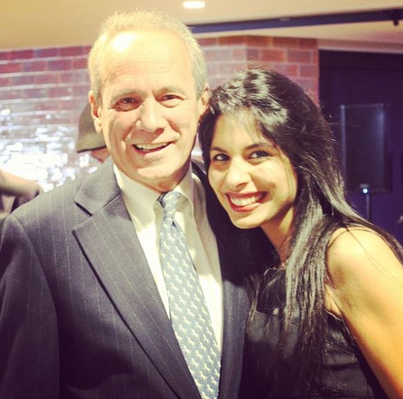 Sheena Melwani with Red Sox President & CEO Larry Lucchino