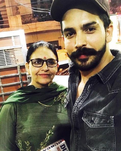 Shehzada Dhami with his mother