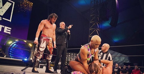 Sonny Kiss comforting a lost opponent with Joey Janela after winning a duel