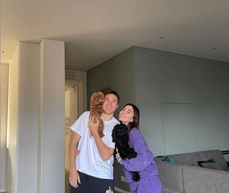 The couple with their dog Melina