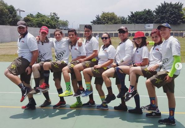 Valentina Acosta Giraldo with her archery team