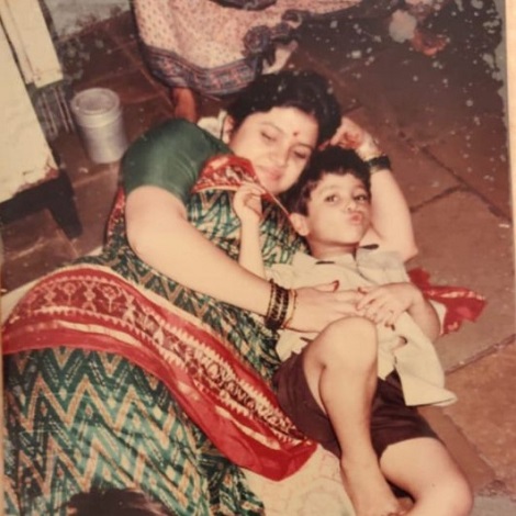 A young Nishant Bhat with his mother