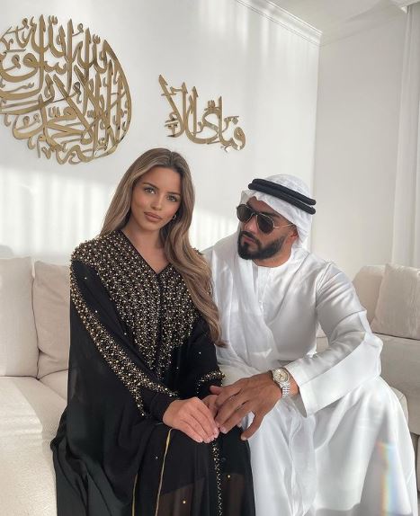 Adelle with her partner Umar Kamani