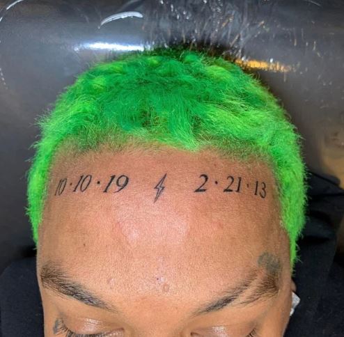 Alexander Edwards's face tattoo