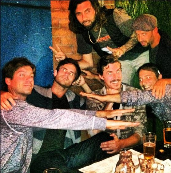 An old photo of Grant Hughes with his friends