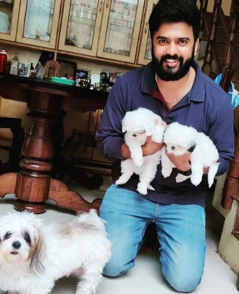 Arjun Gowda with his pet dogs