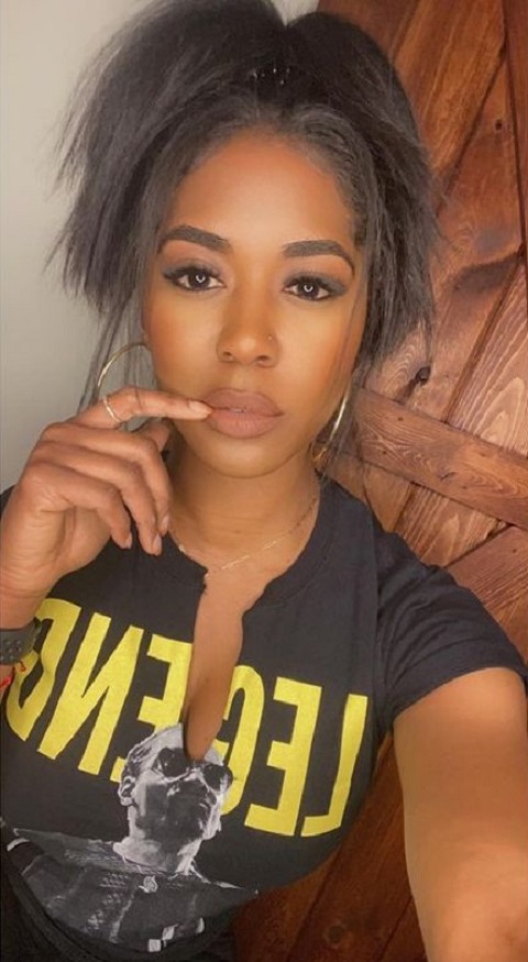 Averie Woodley trying on a different hairstyle