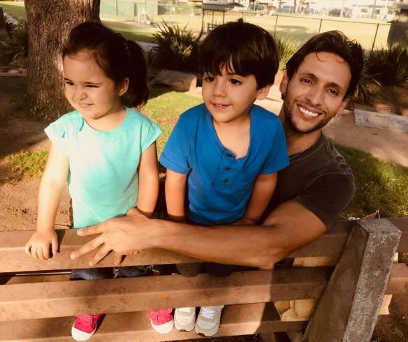 Ben Youcef with his twins Hannah and Harris