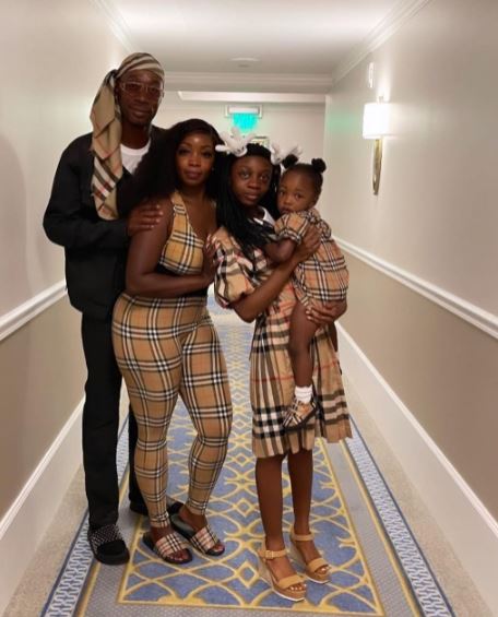 Brother Polight with his wife and children
