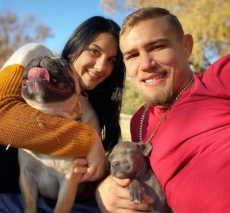 Cheyanne Buys was photographed with her husband JP Buys and their pet dogs