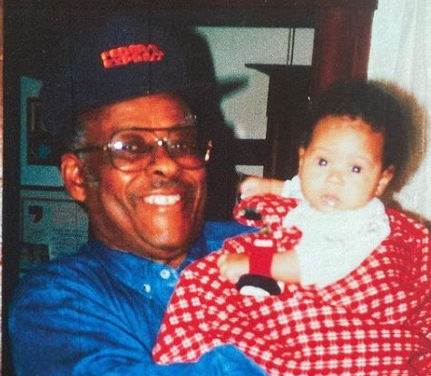 Childhood image of Bridgid Coulter with her grandfather