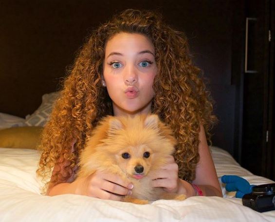 Dossi with her pet dog